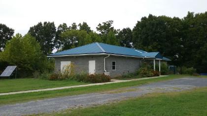 Environmental Education Center building with gardens.