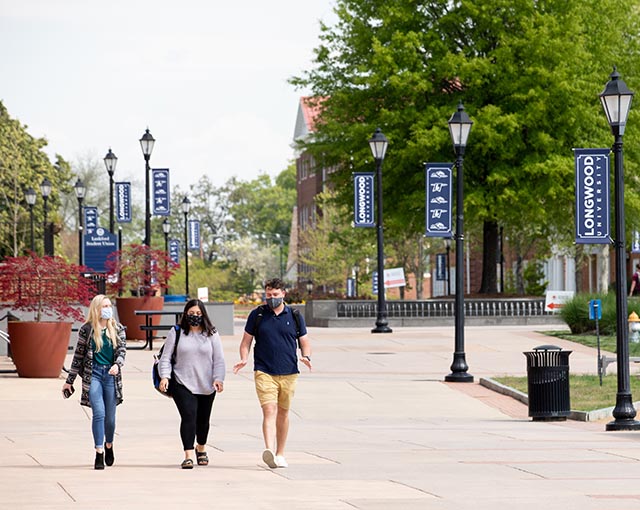 Students walking down Brock Commons