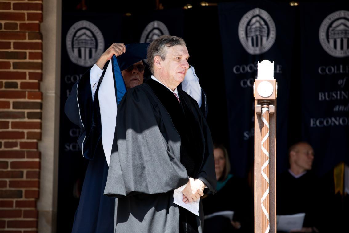 Author and columnist John Feinstein is presented with an honorary degree